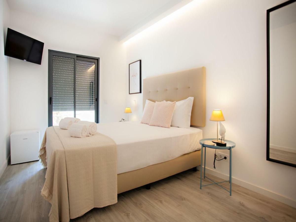 Faro Clara Suites Exteriör bild