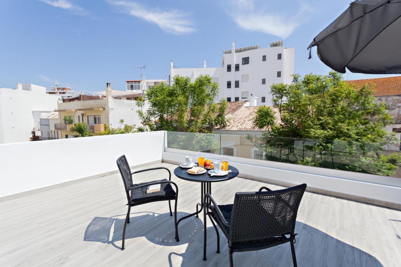 Faro Clara Suites Exteriör bild