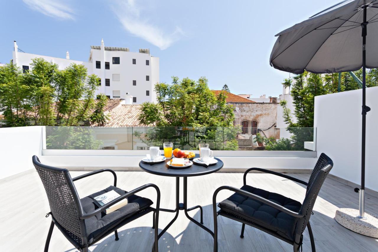 Faro Clara Suites Exteriör bild